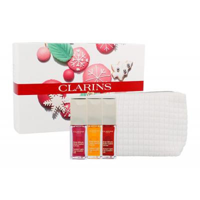 Clarins Instant Light Lip Comfort Oil Trio Dárková kazeta péče na rty 01 Honey 7 ml + péče na rty  02 Raspberry 7 ml +  péče na rty 03 Cherry 7 ml + kosmetická taška